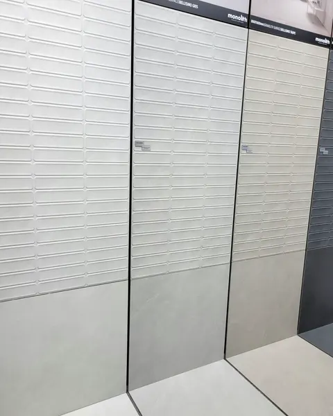 Large-format porcelain, polished finish, neutral grey