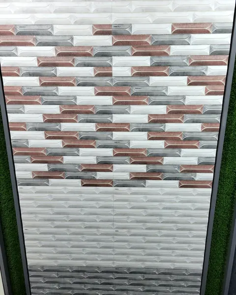 Textured brick-format wall tile, multi-tone colorway